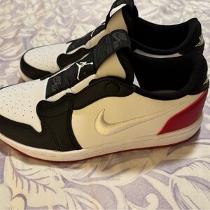 Nike Black, White, and Red Sneakers with Silver Swoosh